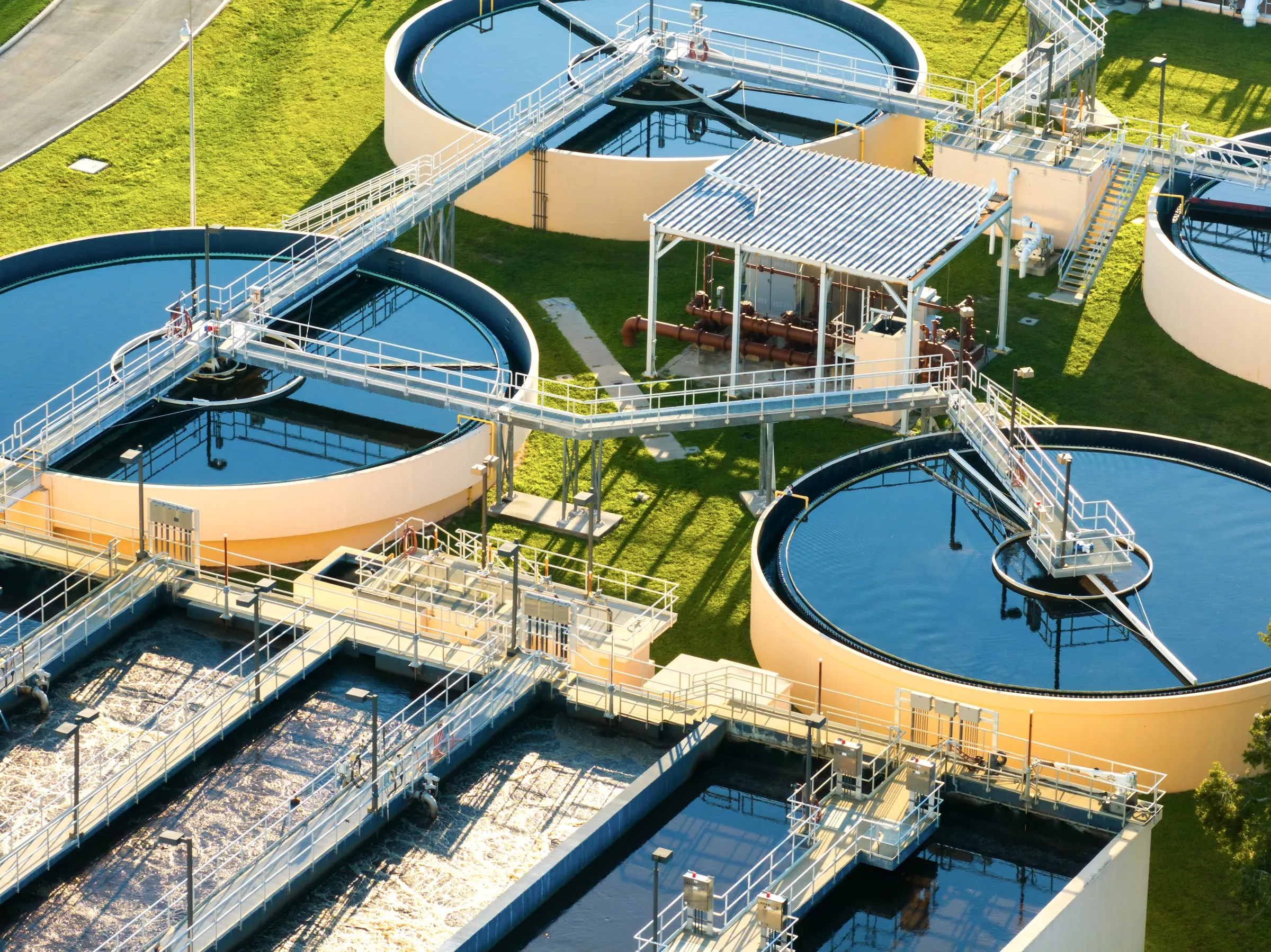 Aerial view of circular clarifier tanks at a water treatment plant