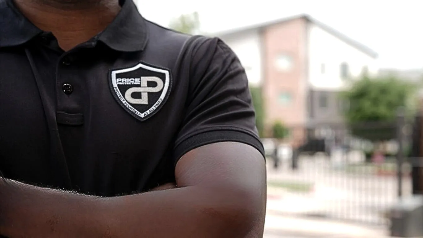 Price Protection officer wearing the company polo with the dP shield badge