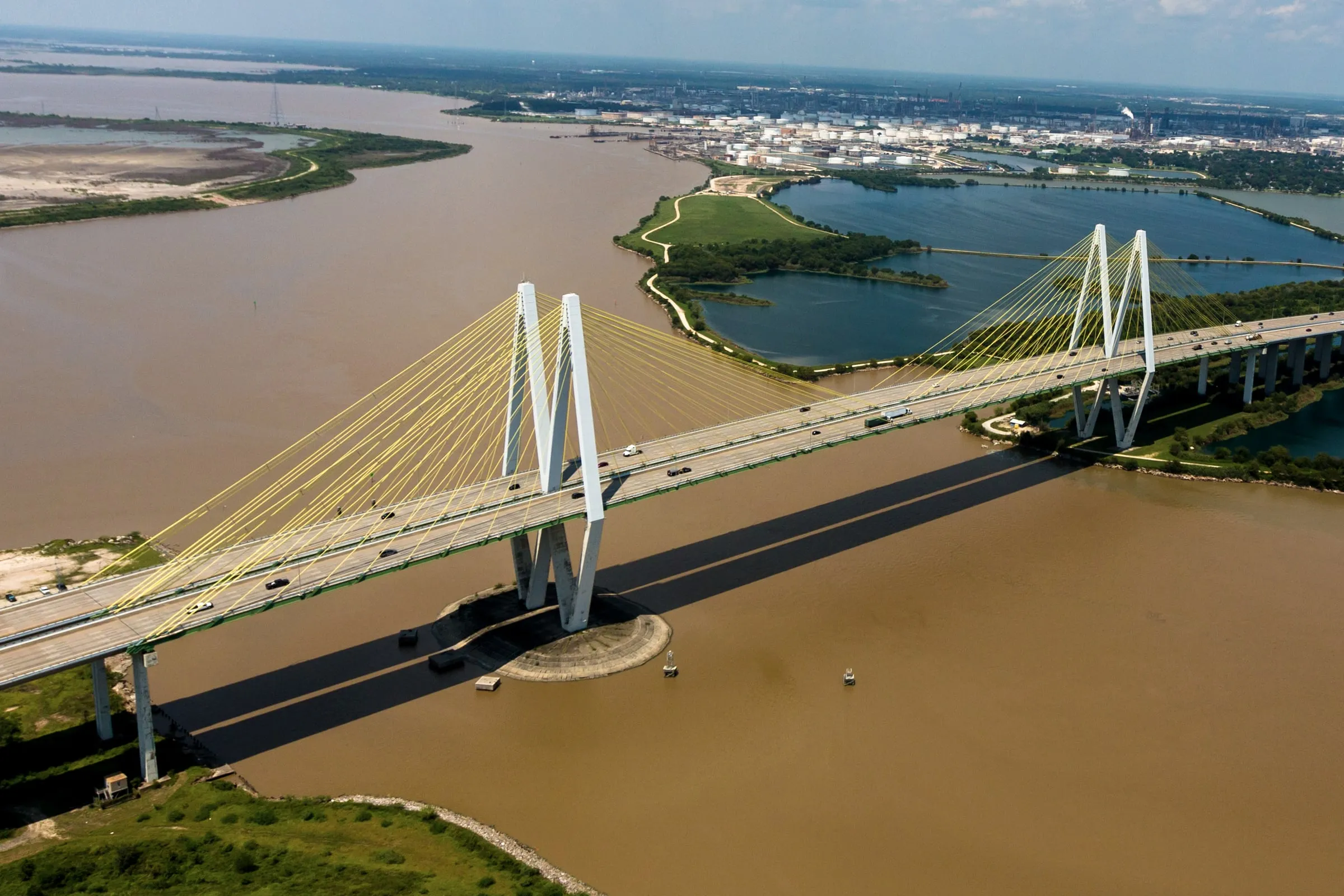 Aerial view of the Fred Hartman cable-stayed bridge crossing the Houston Ship Channel toward Baytown